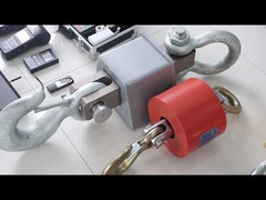 नमूना कक्ष में क्रेन के तराजू लटकाना